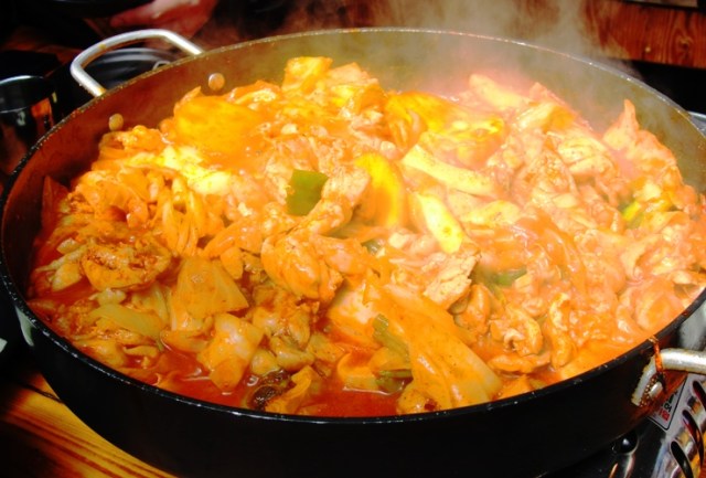 spicy marinated chicken, cabbage, sweet potatoes, onions, tteok, dak galbi , gochujang - Seoul Food - Korean Food