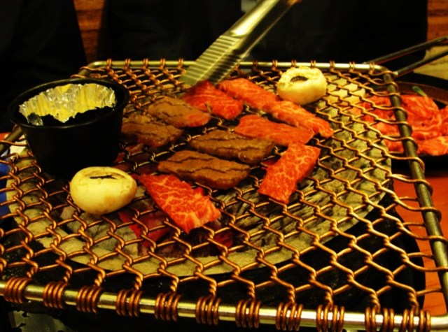 Korean BBQ - Grilling meat - charcoal grill - Korean Food - grilled mushrooms