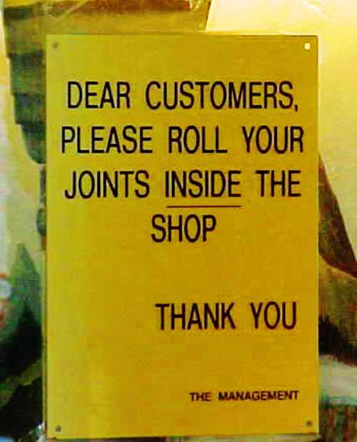 Roll Your Joints inside the shop, humorous signs, Amsterdam, Coffee shop