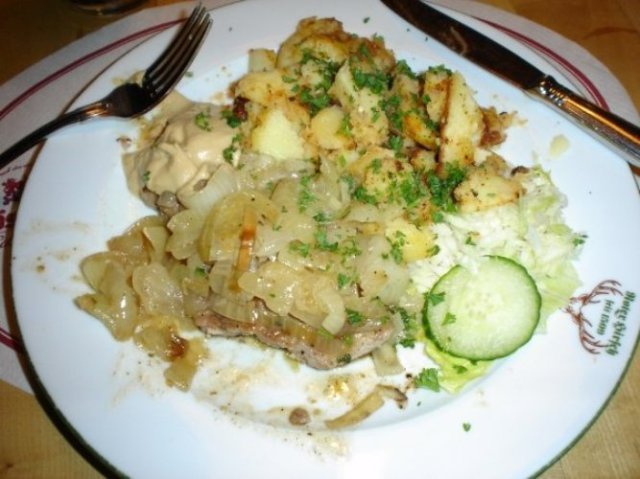 Thuringer Rostbratel,  Pork, roasted onions, roasted potatoes, cucumber salad