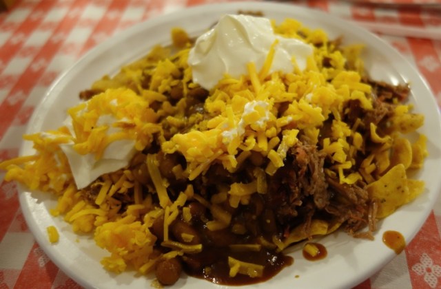 Frito Pie, Fritos, chopped beef, beans, BBQ sauce, cheese, sour cream