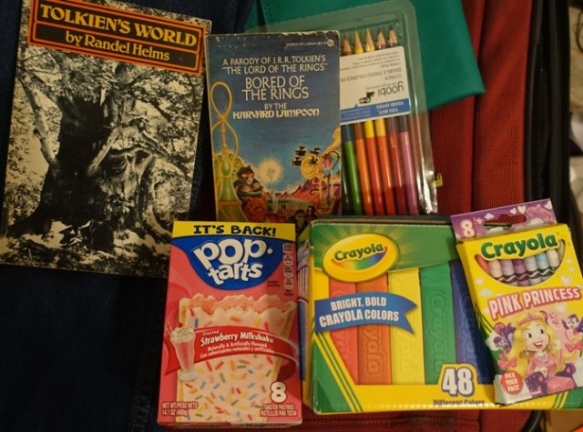 Luggage Items, gifts, chalk, pop tarts, pencils, colors