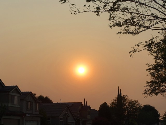 smoky day, red sky, early sunset