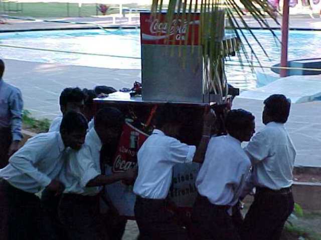 India, manual labor, coke machine, Dominion Resort, Bangalore, how many